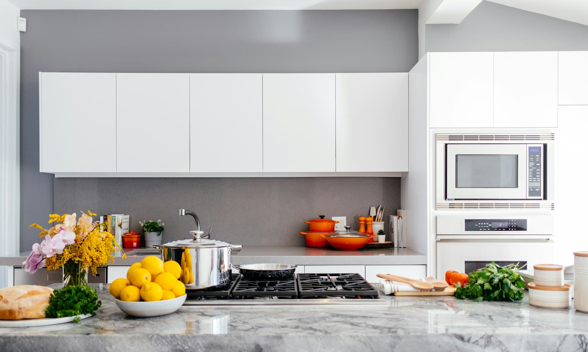 Bright modern manufactured home kitchen with marble counters